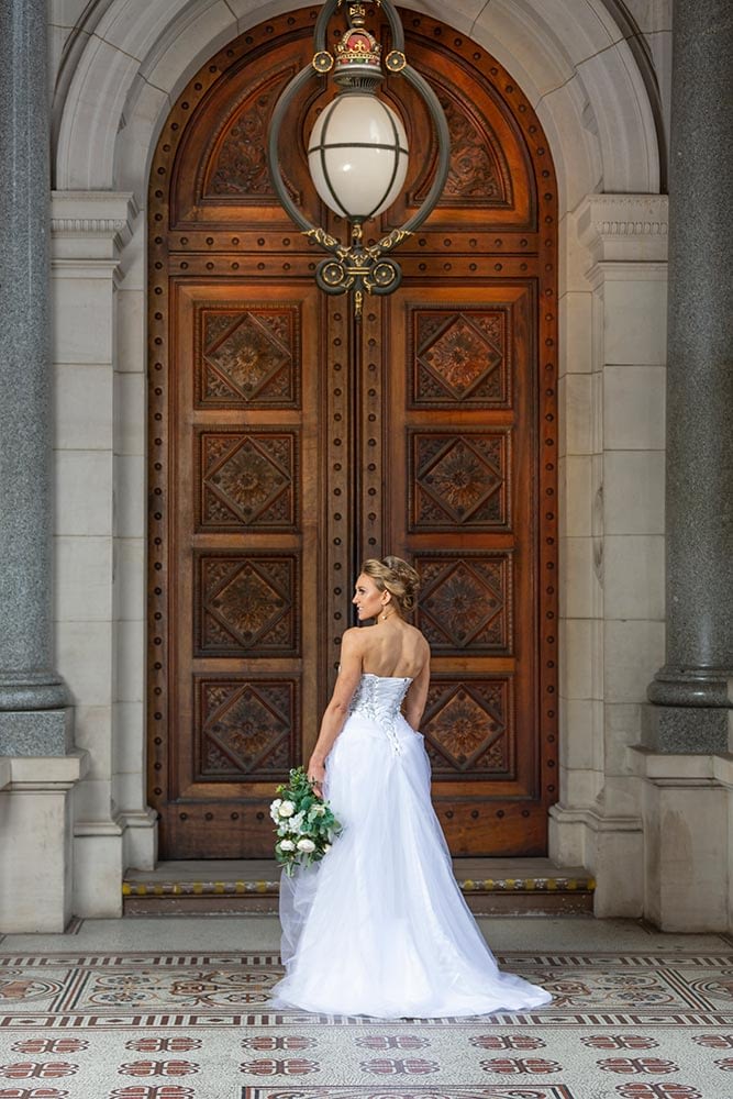 bride portrait in front of beautiful door at Parliament house