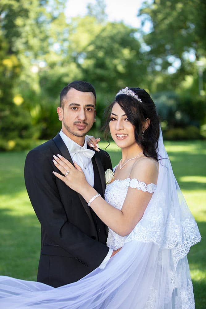 lovely portrait of bride and groom taken at Fitzroy Gardens