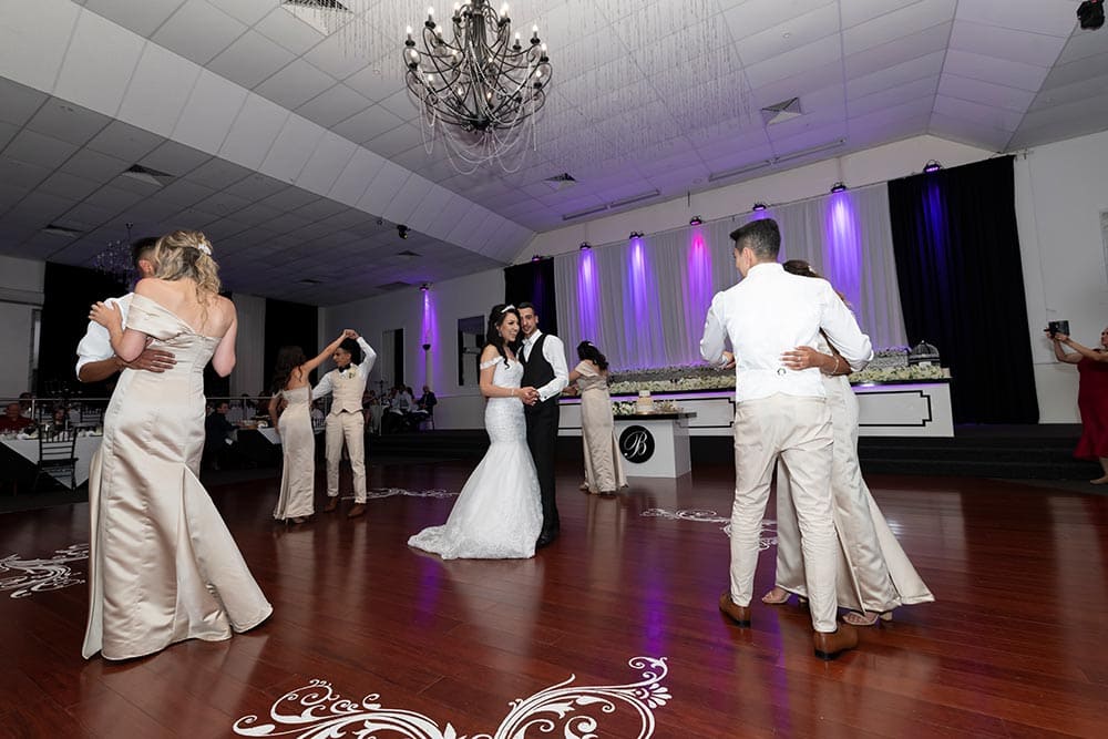 bride and groom at wedding reception dancing